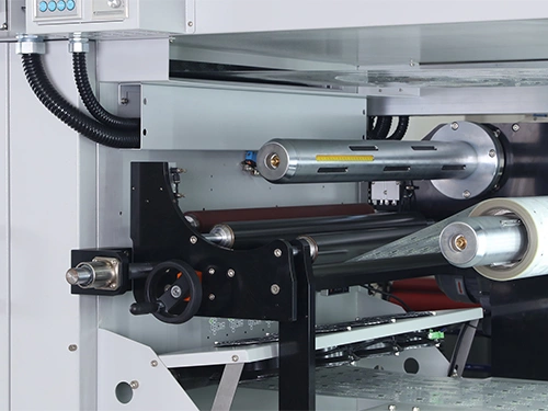Web-guiding and laminating units (optional)